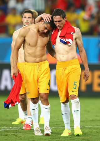 Illustration for article titled Sweaty and Sweet: The World Cup's Most Tender Man-Hugs